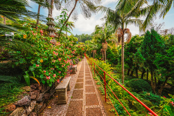 Monte Palace, Tropical Garden with Waterfalls, Lakes and traditional buildings above the city of...