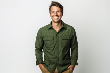 Fototapeta premium Portrait of a happy man in his 30s sporting a breathable hiking shirt on white background