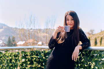 Businesswoman's Tranquil Coffee Break: Finding Serenity on the Company Terrace
