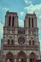 Fototapeta premium Sightseeing in Paris through Montmartre, the Latin Quarter, Notre Dame, the Eiffel Tower, the Champs Elysées, the Louvre Museum and the streets with ancient buildings, in the year of the Olympic Games