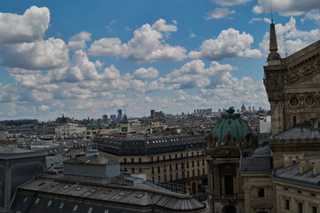 Sightseeing in Paris through Montmartre, the Latin Quarter, Notre Dame, the Eiffel Tower, the Champs Elysées, the Louvre Museum and the streets with ancient buildings, in the year of the Olympic Games