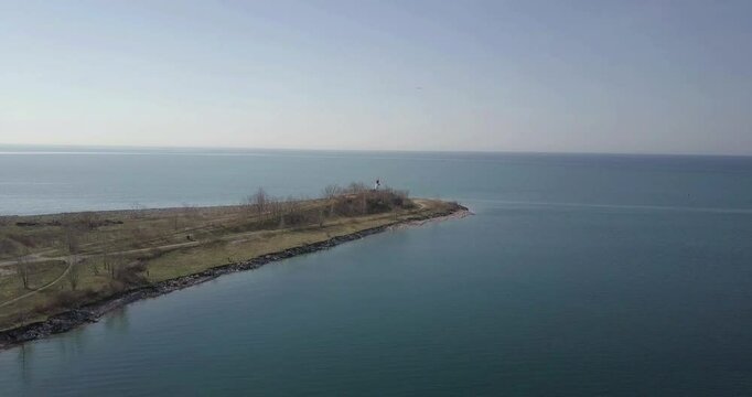 Flying over lighthouse Close to the sea
Tommy Thompson Park lighthouse, Toronto, Canada

