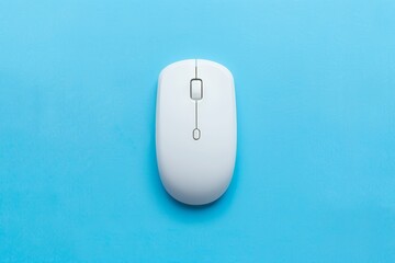 White wireless mouse from top view on blue background