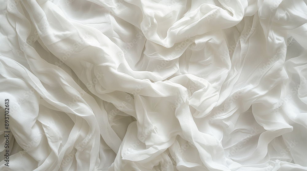 Poster a crumpled white sheet or fabric with multiple folds and creases. the creases are uneven and vary in