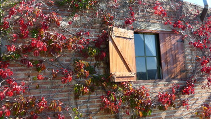 brick wall with window in the mountains