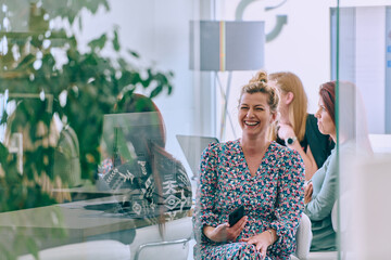 Business Team of Women Discussing New Topics and Strategies to Improve Client Operations.