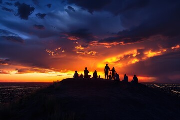 Fototapeta premium As the sun set behind dark storm clouds, people gathered on top of an empty hilltop were silhouetted against the sky Generative AI
