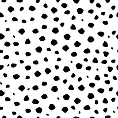 Vector illustration of seamless black dot pattern with different grunge effect rounded spots isolated on white background