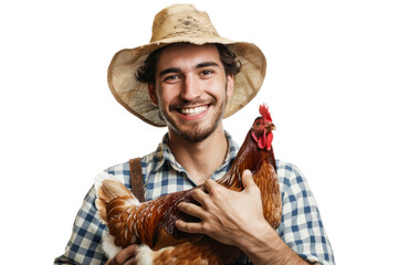 Fototapeta premium Young farmer with hat and bright smile holding a chicken Isolated on white background