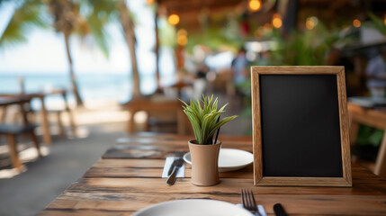 a black chalkboard serving as a mockup for a restaurant menu. The chalkboard is clean and prominently placed