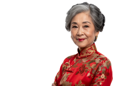 Optimistic senior Asian woman wearing traditional attire, looking at camera, isolated on white background - Powered by Adobe