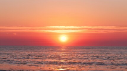 Obraz premium Pink and Orange Sunset Over the Ocean