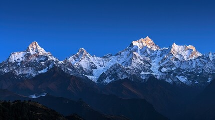 Snow-Covered Himalayan Mountain Range at Sunrise