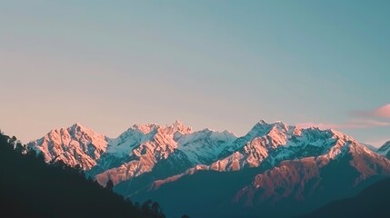 Snow-Capped Mountain Range at Sunrise in Himalayas