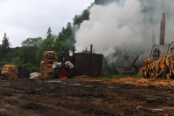 view of the place of traditional charcoal burning out in the Bieszczady Mountains in the town of...