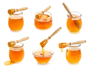 Set of various jars and bowls full of honey with wooden dipper on white background
