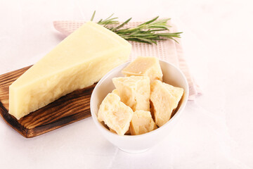 Chopped Italian hard parmesan cheese