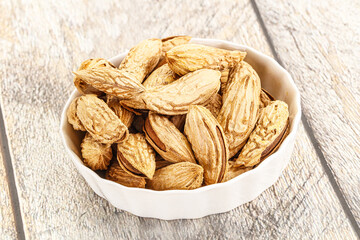 Shelled dry almond nut heap