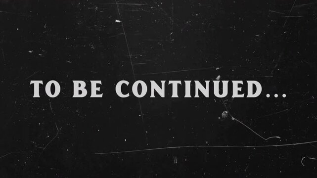 Retro Outro. Are-created film frame from the silent movies era, showing an intertitle text - To be continued. Vintage film damage and scratches.