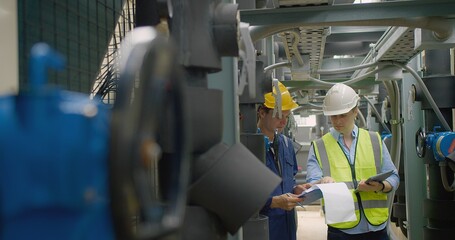 Civil engineer manager and foreman worker checking industry cooling air conditioner water cooling...