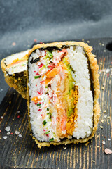 Homemade asian style gluten free sushi salmon burger.