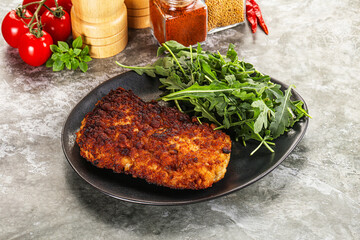 Tasty roasted breaded meat schnitzel