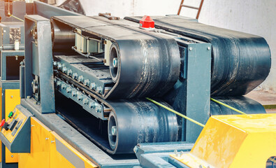 Equipment for production of plastic wire for construction. Machine in shop. Industry background.