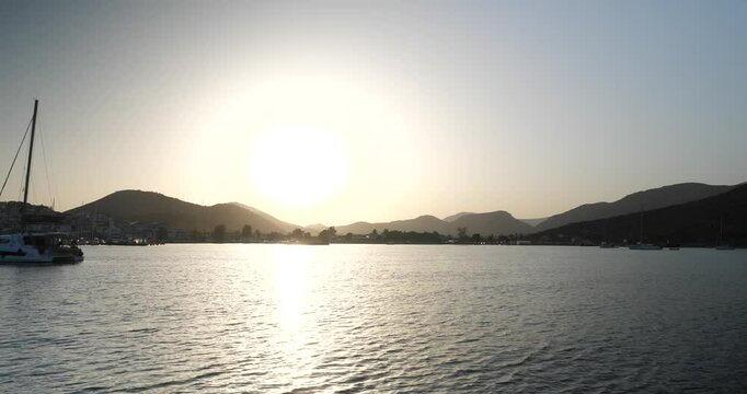 A view of the Ermioni bay during the sunset. Ermioni, Greece - June 23, 2024.