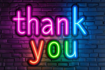 Vibrant Neon "Thank You" Sign Illuminating a Dark Brick Wall Background