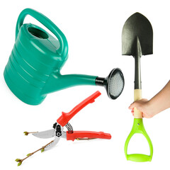 Garden watering can, shovel and pruning shears isolated on a white. There is free space for text....