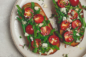 arugula sandwiches and cherry tomatoes, cheese with mold, breakfast, snack, homemade,