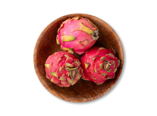Pitayas or Dragon fruits on a bowl isolated over white background