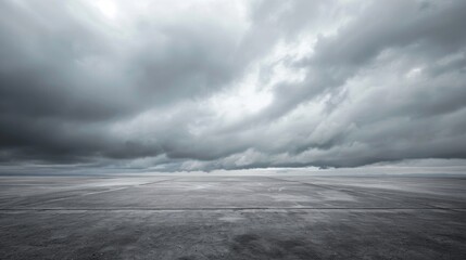 Gray Sky. Dramatic Stormy Clouds on Horizon Over Dark Concrete Floor