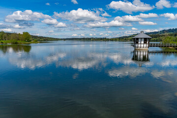 Fototapeta premium Leisurely hike in early summer at Rottachsee in the Allgau