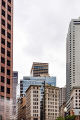 Fototapeta premium cityscape of old and new buildings in overcast day