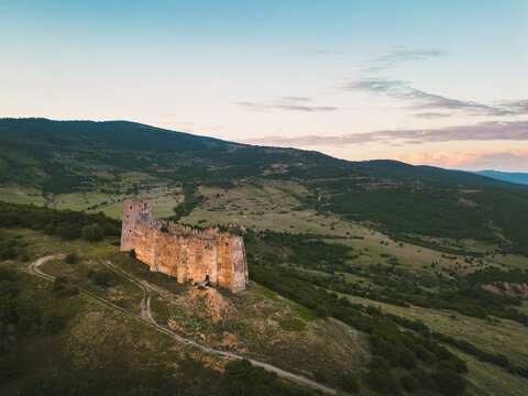 Aerial approaching view The Skhvilo fortress or Skhvilo castle. Medieval fortress in region of Shida Kartli, in Kaspi District, Georgia. 14th century. Served as residence of the duke family Amilakhor
