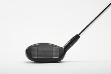 Close-up photo of a golf club isolated against a white background. Space for copy. Golf and leisure concept.