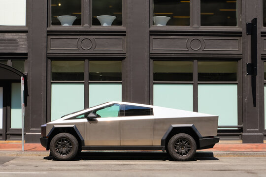 Boston, USA - 17 July 2024. Tesla cybertruck parked in the city, electric vehicles in america