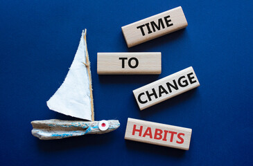 Time to Change Habits symbol. Wooden blocks with words Time to Change Habits. Beautiful deep blue...