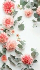 An elegant arrangement of coral and light pink flowers with eucalyptus leaves on a white background.
