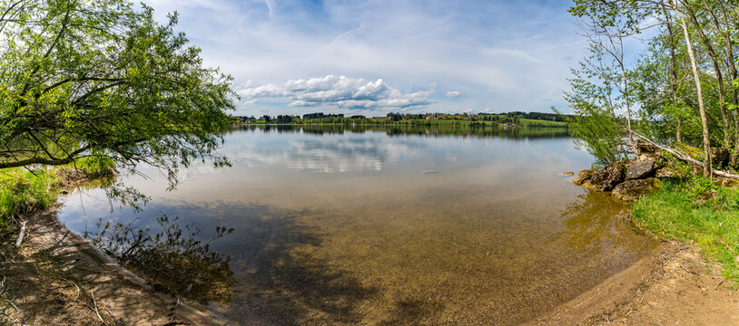 Leisurely hike in early summer at Rottachsee in the Allgau