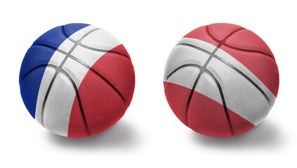 basketball balls with the national flags of austria and france on the white background.
