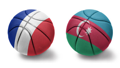 basketball balls with the national flags of azerbaijan and france on the white background.