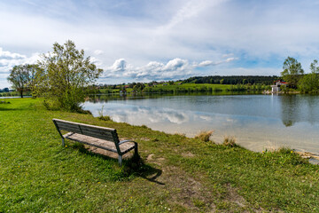 Leisurely hike in early summer at Rottachsee in the Allgau