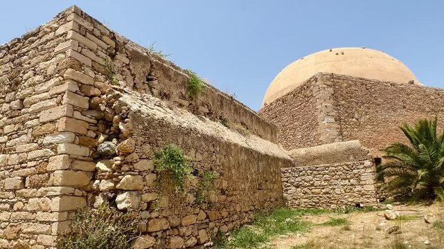 Walking around medieval or ancient ruins of a fortress