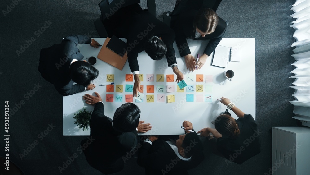 Poster top down aerial view of manager discuss and choose marketing idea from sticky notes. group of busine