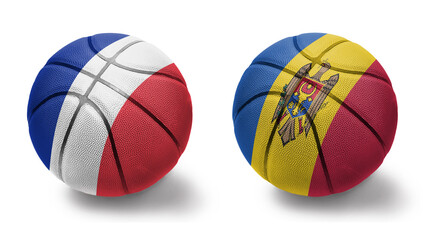 basketball balls with the national flags of moldova and france on the white background.