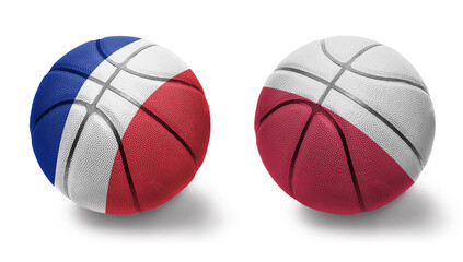 basketball balls with the national flags of poland and france on the white background.
