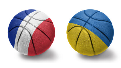 Obraz premium basketball balls with the national flags of ukraine and france on the white background.
