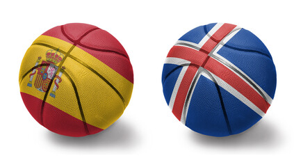 basketball balls with the national flags of iceland and spain on the white background.